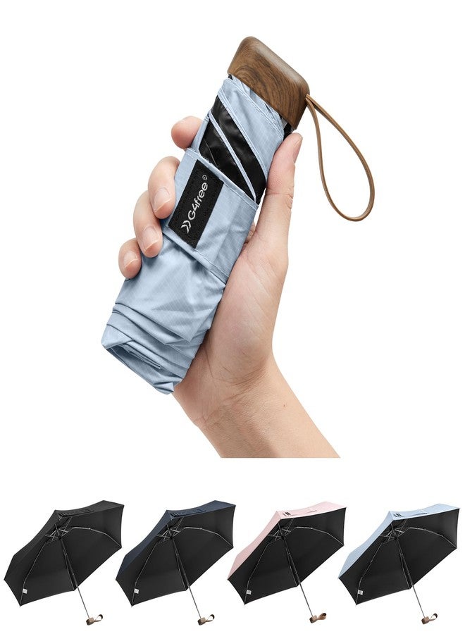 جي4فري مظلة سفر صغيرة قابلة للطي من G4Free، مظلة صغيرة الحجم توفر حماية من الأشعة فوق البنفسجية بدرجة 50+، مناسبة للحقائب والمحافظ، وخفيفة الوزن، وتناسب الجيب والمحفظة، للرجال والنساء (أزرق فاتح). - Image 1