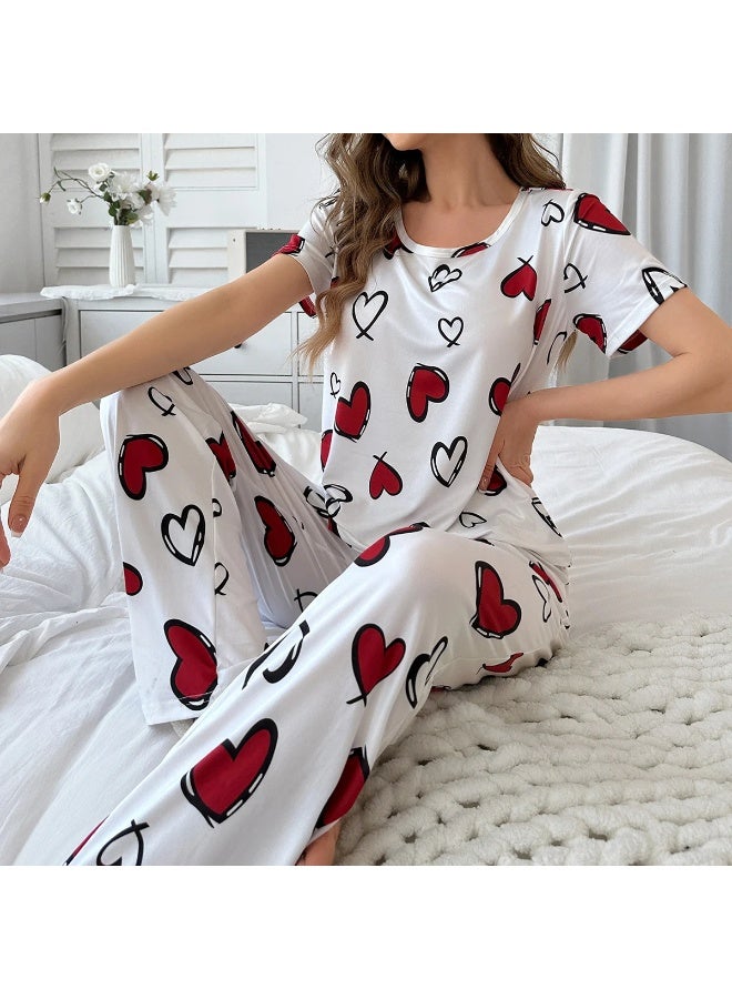 طقم بيجامة نسائي باللون الأبيض مع طباعة قلوب حمراء - Image 2