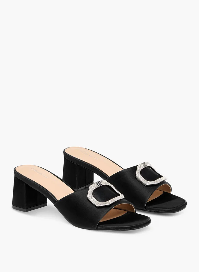 فلورا بيلا من شو إكسبرس Embellished Slip-On Sandals with Block Heels