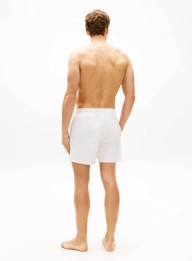 TOMMY HILFIGER Ivory Petal Flag Embroidery Mid Length Swim Shorts for Men | Best Price UAE