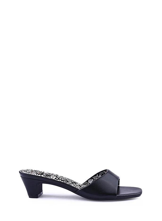 أيقون صنادل نسائية بكعب عريض وطبعات زهور