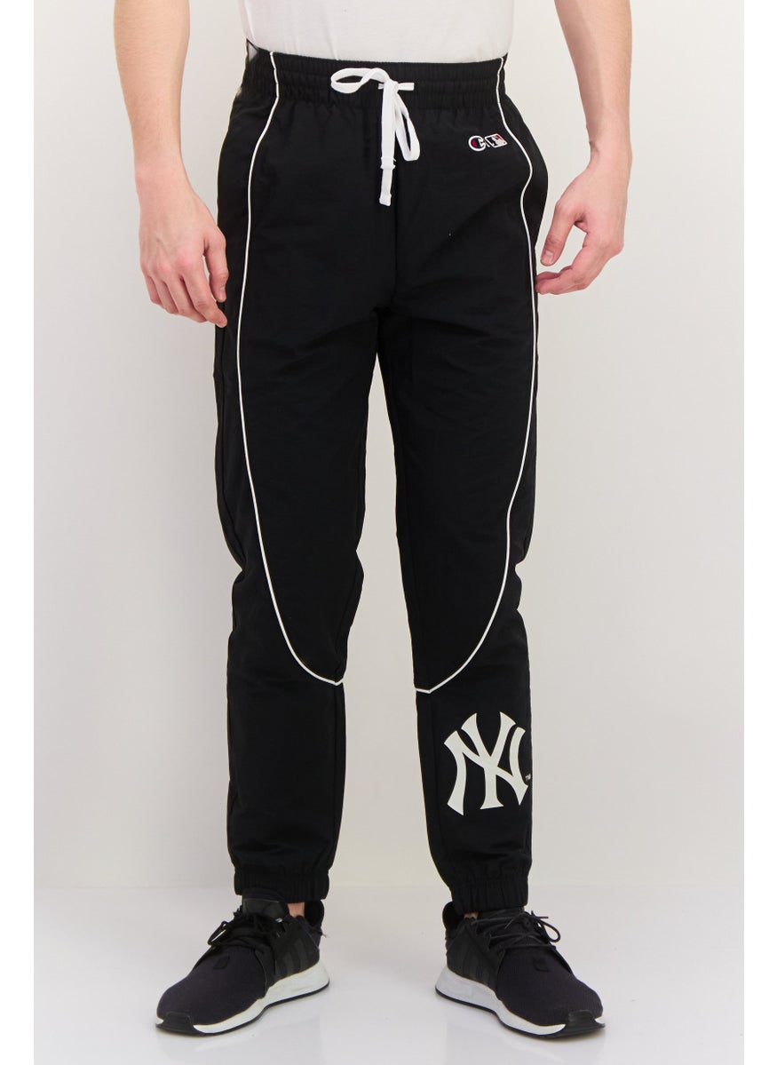 Champion Men Custom Fit Brand Logo Training Sweatpants, Black  - Image 1
