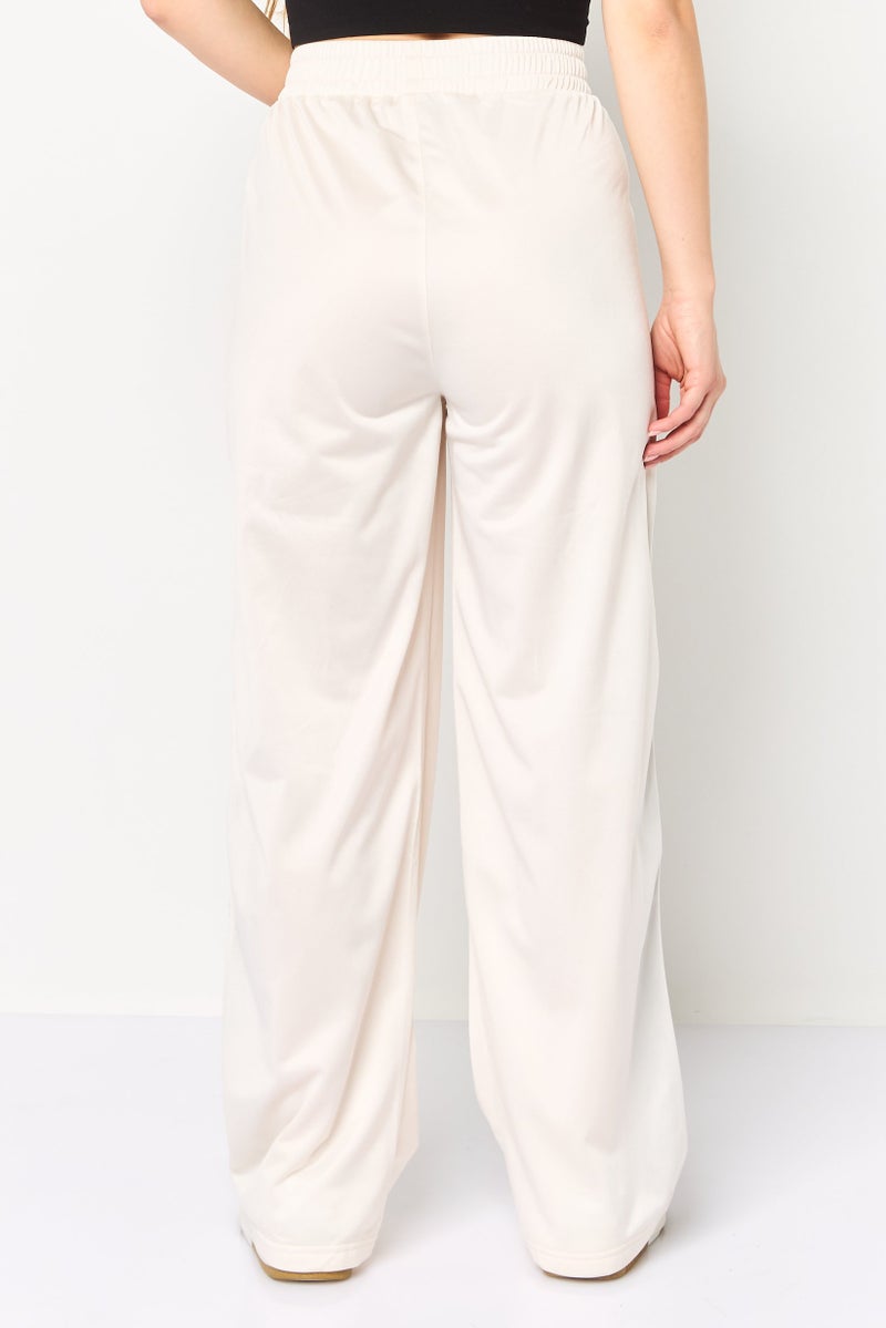 Champion Women Sportswear Fit Embroidered Logo Outdoor Track Pants, Ivory - Image 4