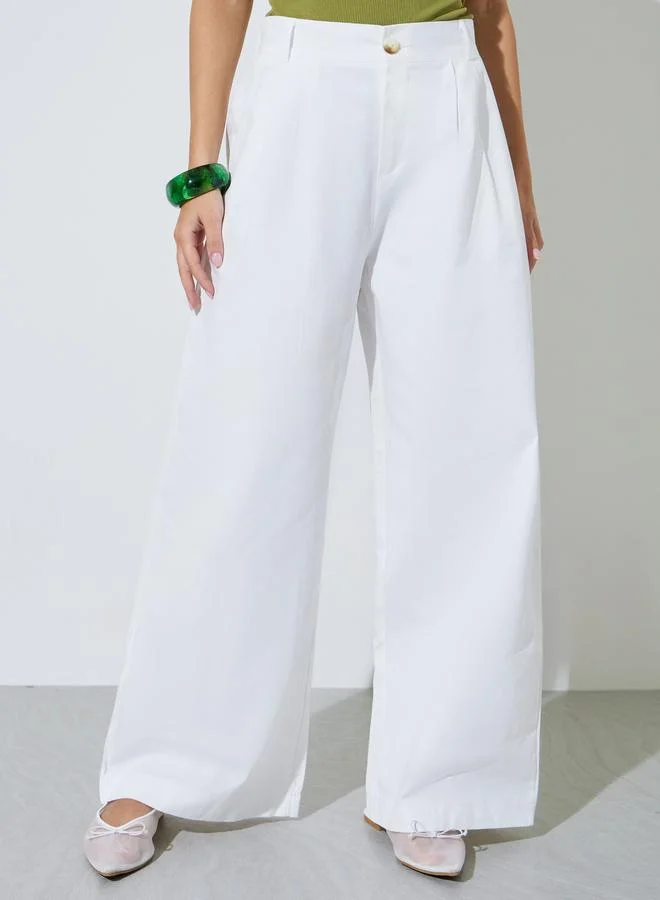 ستايلي White Solid Wide Leg Trousers