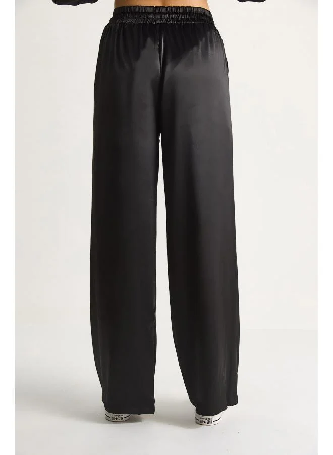 جينجر بنطلون ساتان واسع الساق