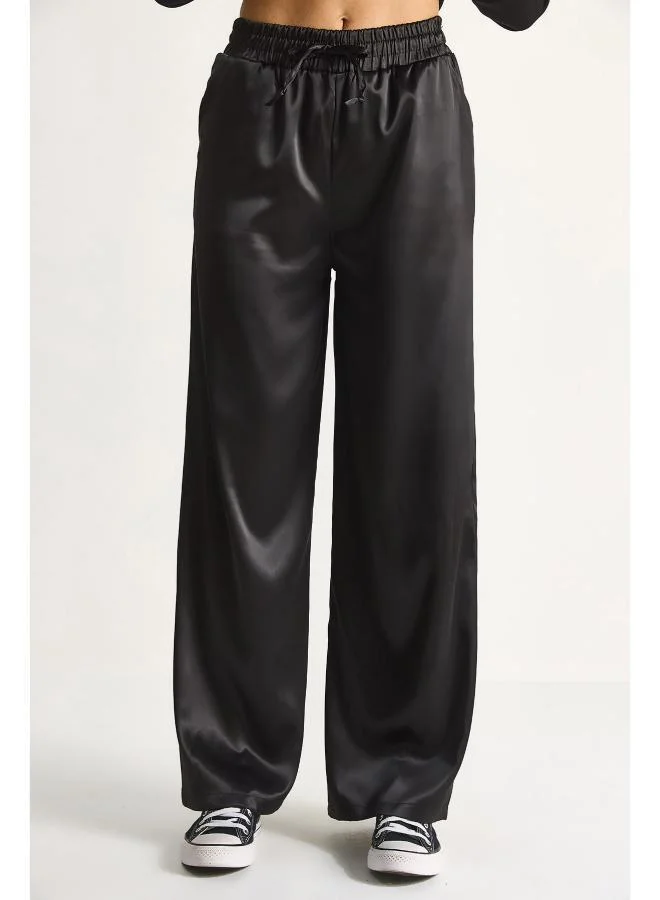 جينجر بنطلون ساتان واسع الساق