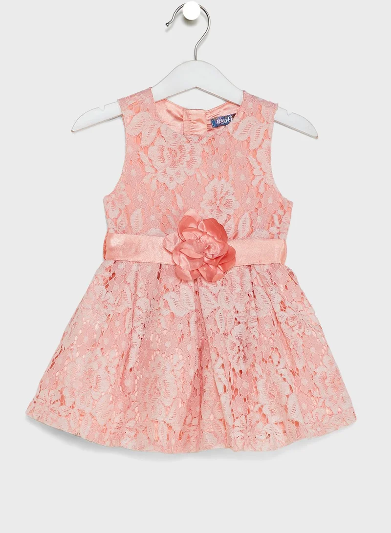 Nautinati Net Partywear Dress With Flower On Waist