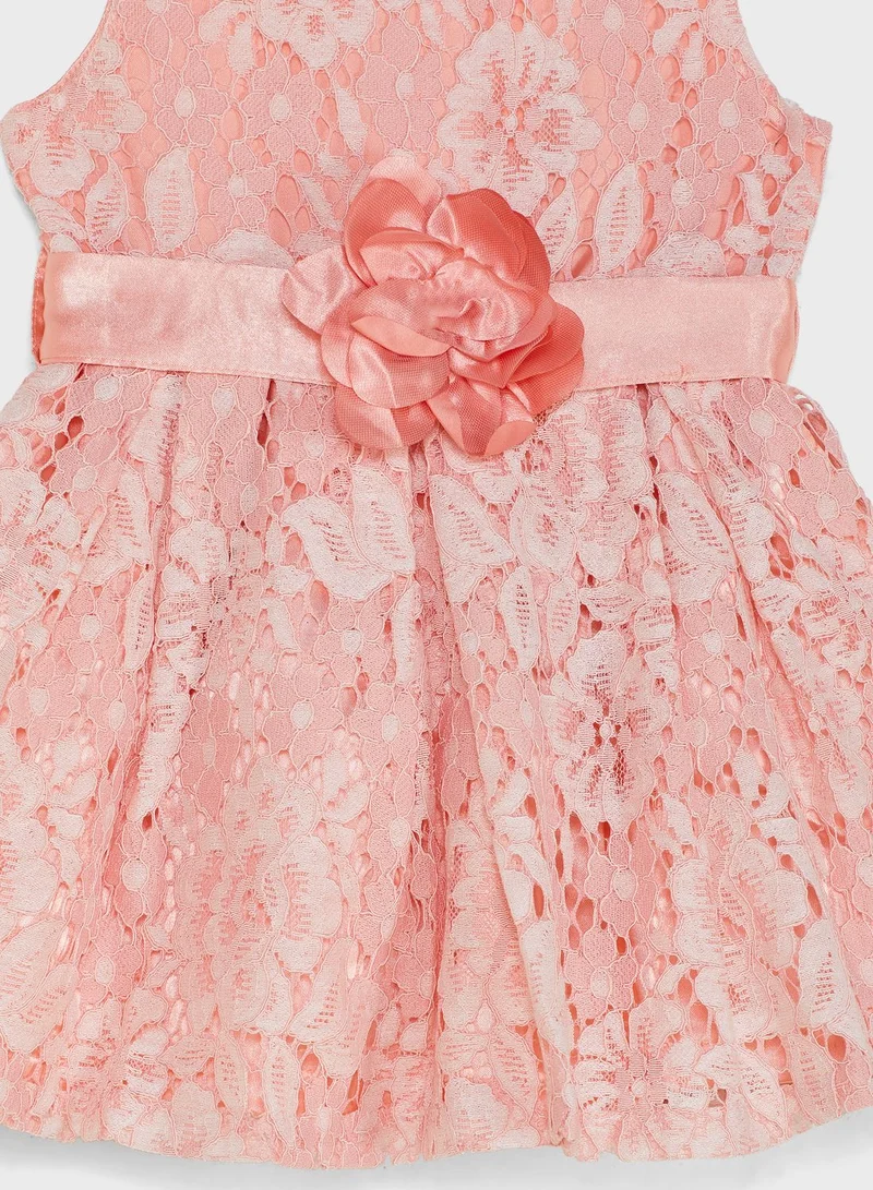 Nautinati Net Partywear Dress With Flower On Waist