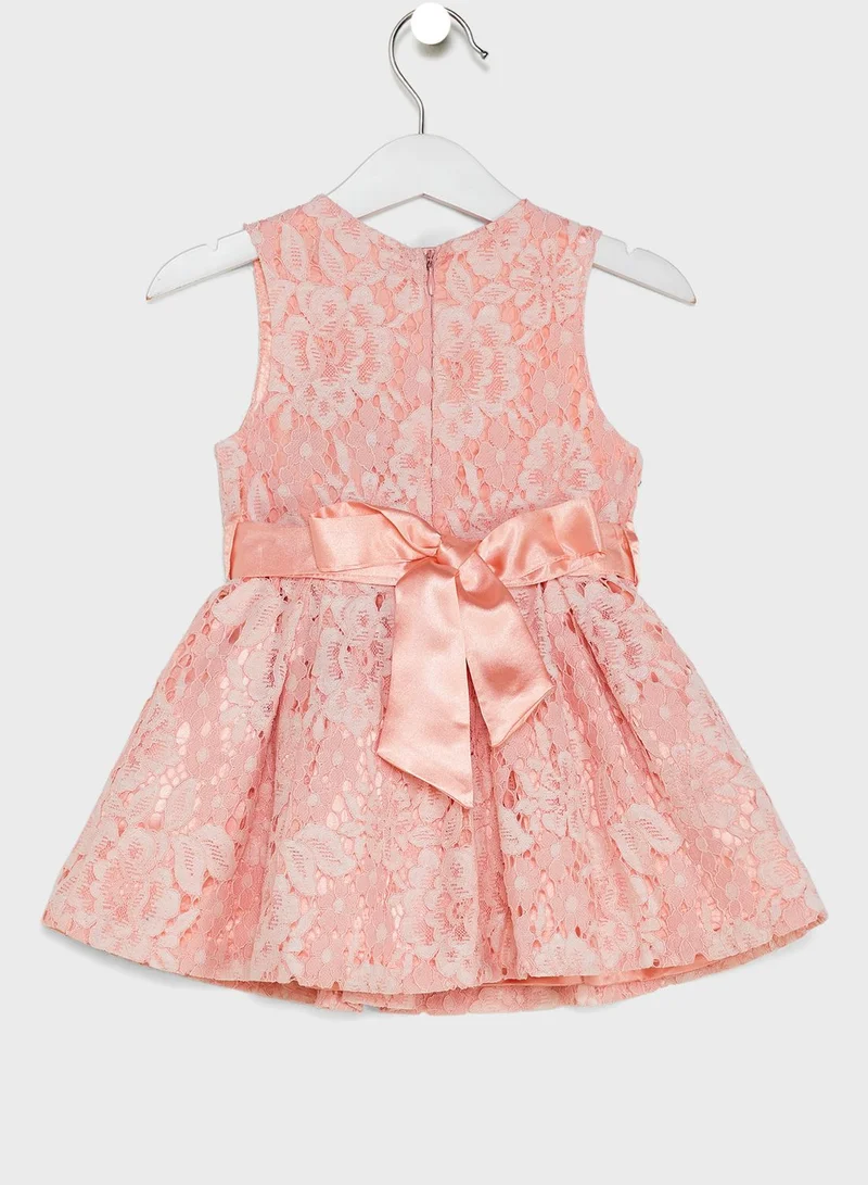 Nautinati Net Partywear Dress With Flower On Waist
