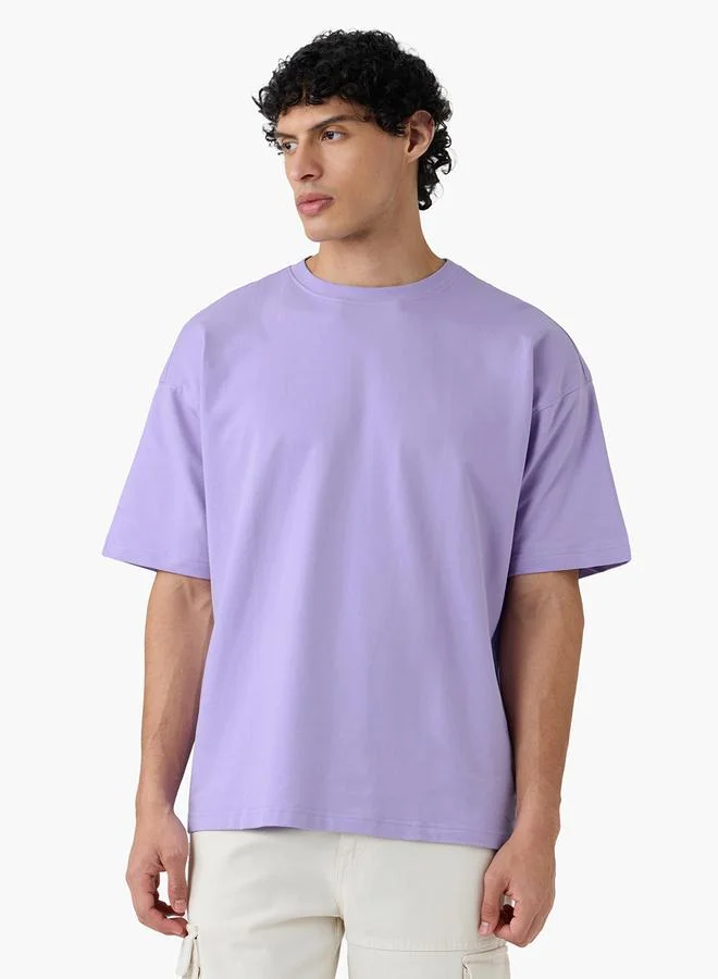 ذا سوليد ستور تيشيرت كاجوال واسع