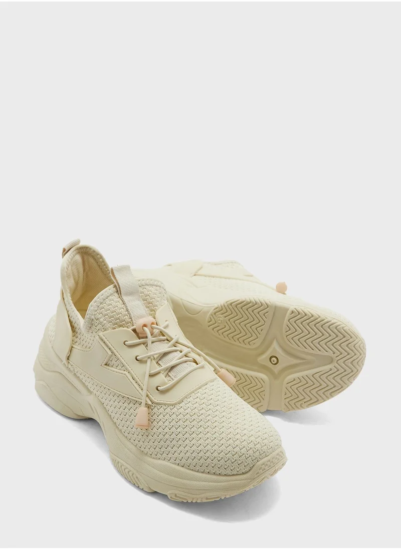 ترافل من نمشي Chunky Pull On Sneaker