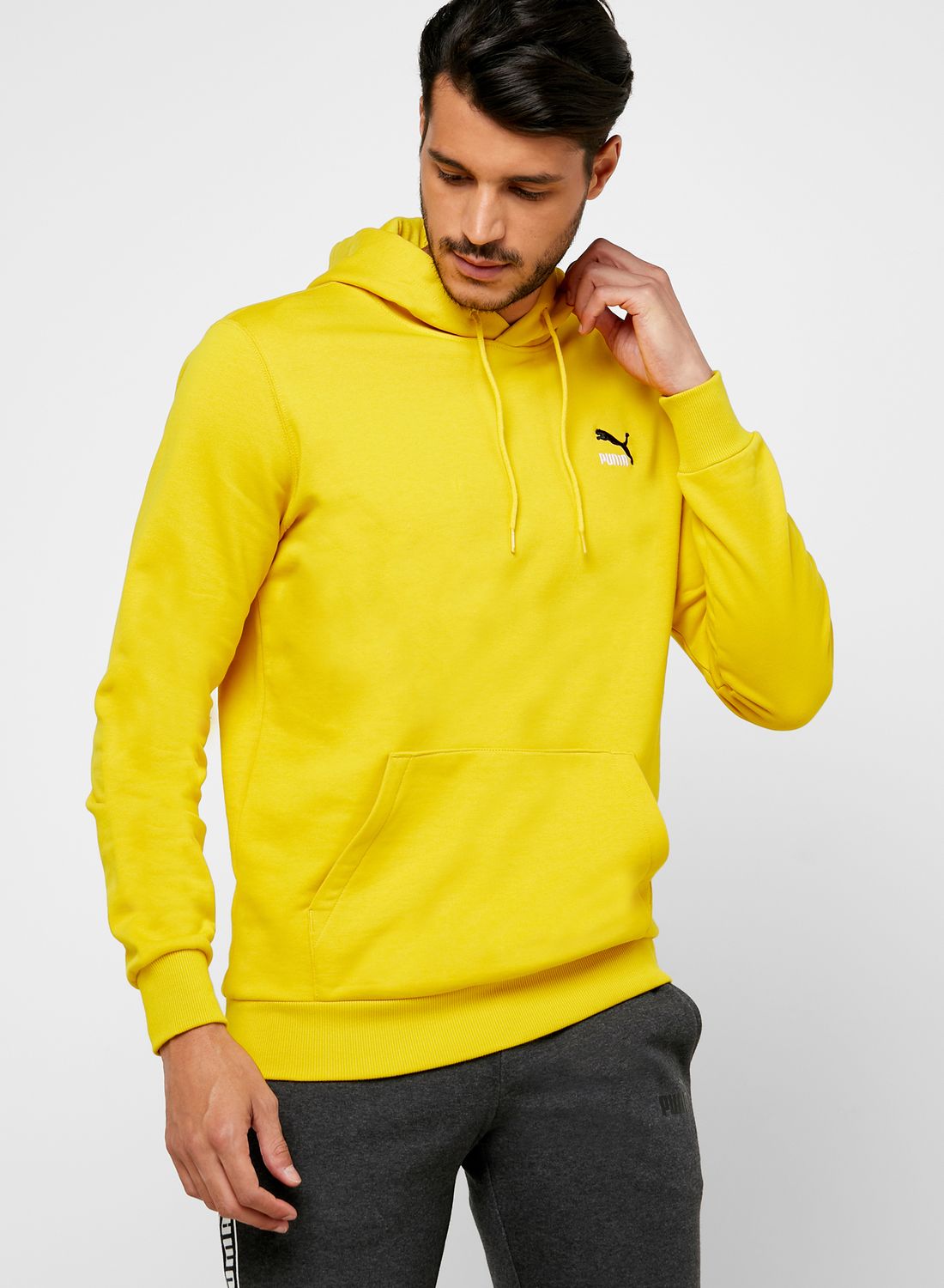 Buy Puma Dark Yellow Classics Embroidered Hoodie for Men in Oman