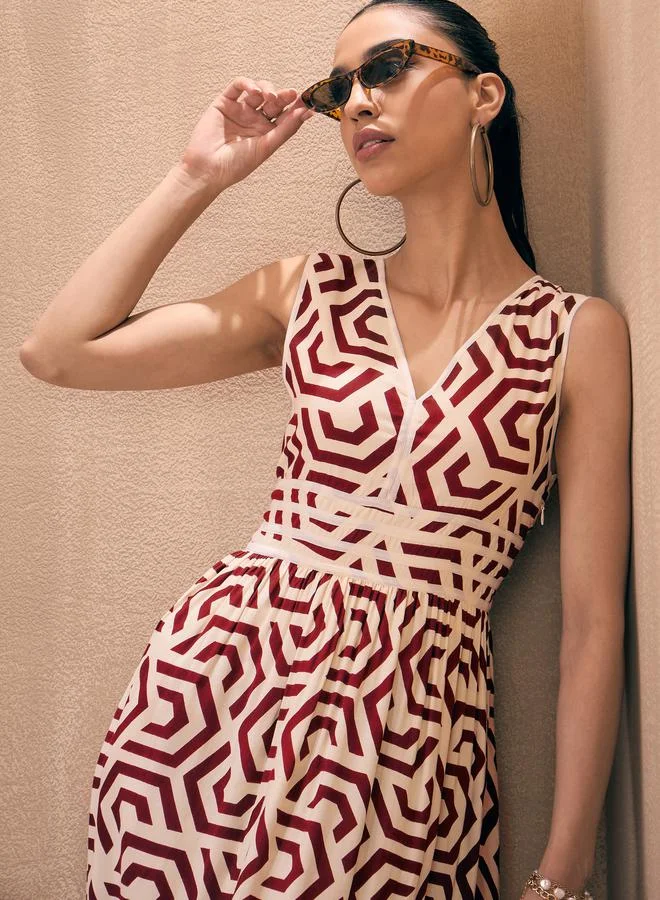 SASSAFRAS Geometric Back-Tie Dori Cut-Out Maxi Dress by Styli