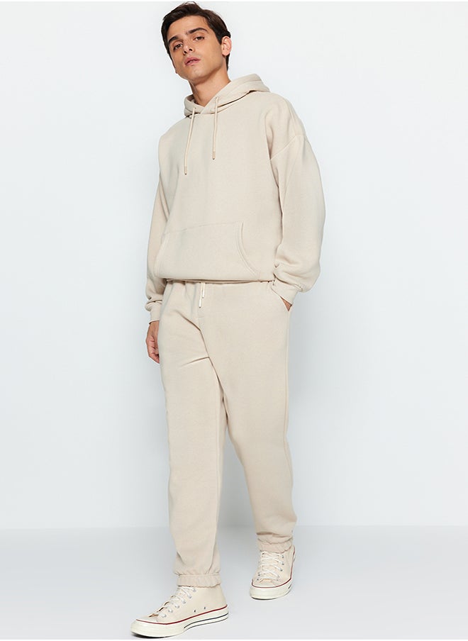 trendyol Stone Oversize/Wide Cut Basic Cotton Tracksuit Set with Elastic Legs and Fleece Inside TMNAW24EM00002  - Image 1