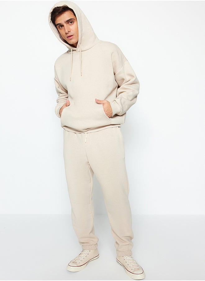 trendyol Stone Oversize/Wide Cut Basic Cotton Tracksuit Set with Elastic Legs and Fleece Inside TMNAW24EM00002  - Image 2