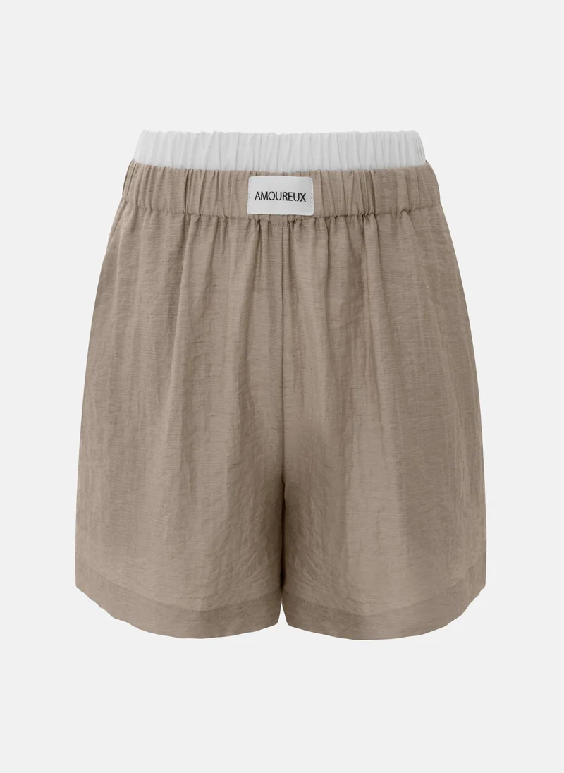 ليتشي شورت قصير فضفاض مع حزام خصر بلون متباين