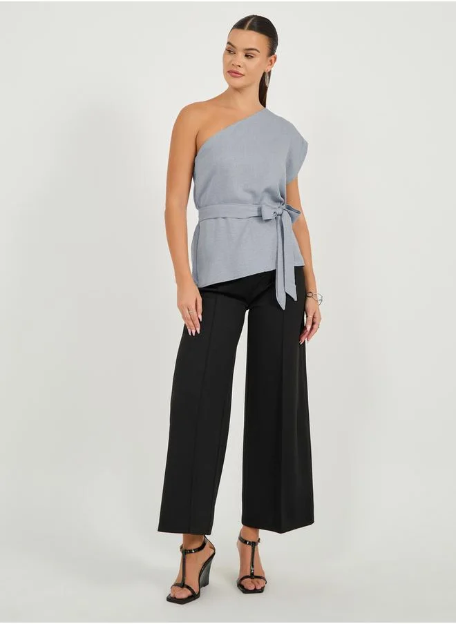 Styli Solid One Shoulder Top with Waist Belt Detail