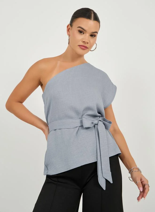 Styli Solid One Shoulder Top with Waist Belt Detail
