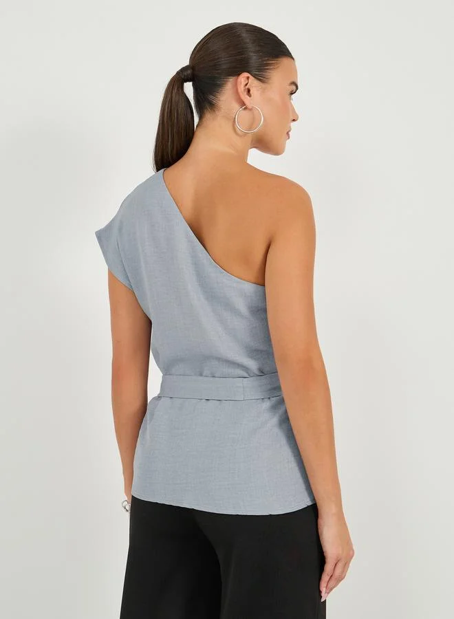 Styli Solid One Shoulder Top with Waist Belt Detail