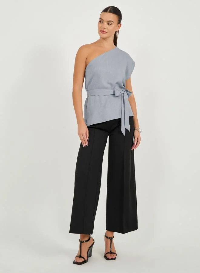 Styli Styli Solid One Shoulder Top With Waist Belt Detail