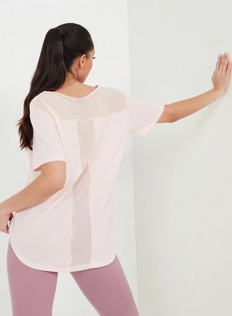 Styli Active Pink T-Shaped Mesh Back Panel Active Top for Women | Best Price UAE