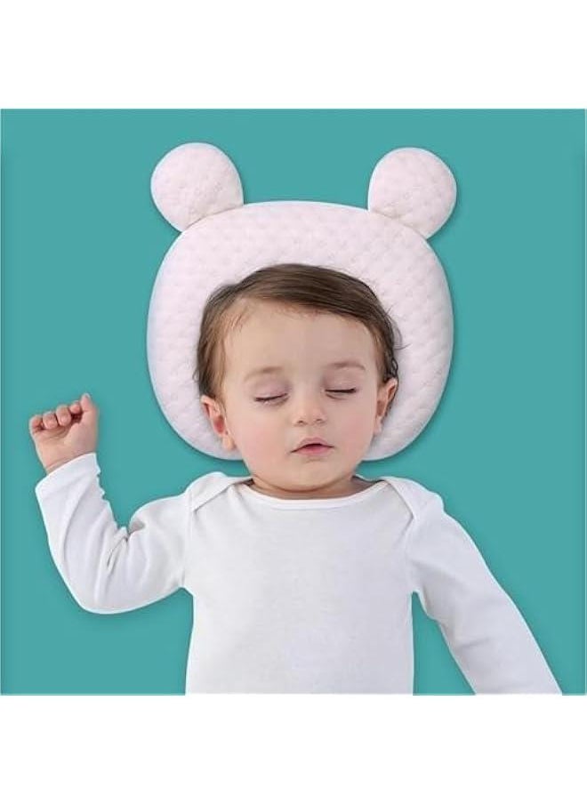Baby head shaping pillow, made of silicone and memory foam with a triangular design for infants and newborns, flat head prevention pillow