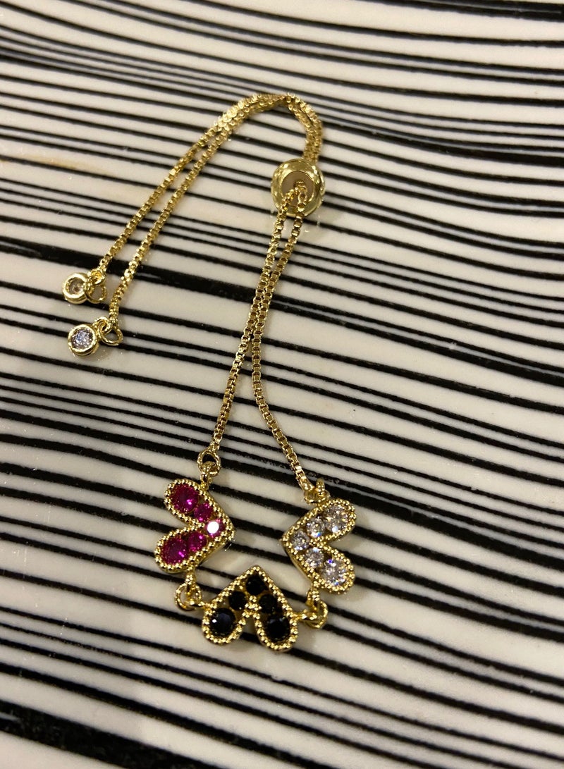 نونز أب اسوارة نسائية ذهبي بقلوب ملونة ومرصعة بالزركون - Image 2