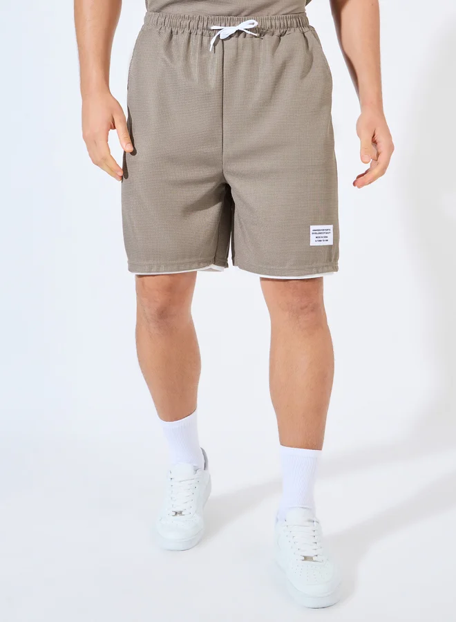 Styli Styli Waffle Knit Oversized Badge T-Shirt and Shorts Co-Ords