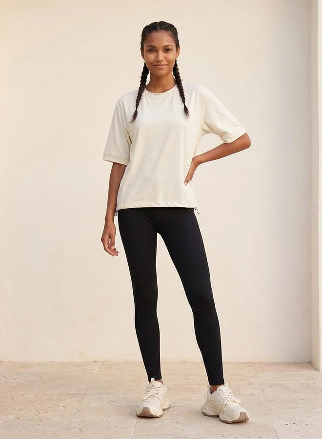 Kappa WHITE Kappa Textured 4-Way Stretch T-shirt for Women | Best Price UAE