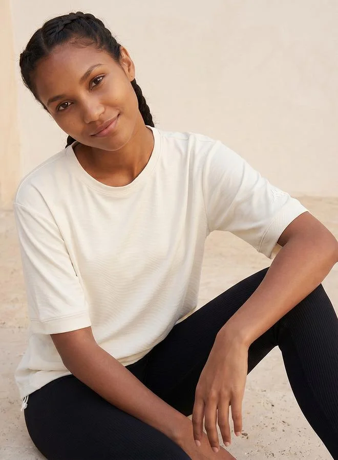 Kappa WHITE Kappa Textured 4-Way Stretch T-shirt for Women | Best Price UAE