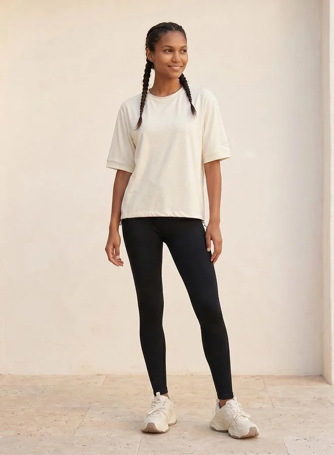 Kappa WHITE Kappa Textured 4-Way Stretch T-shirt for Women | Best Price UAE