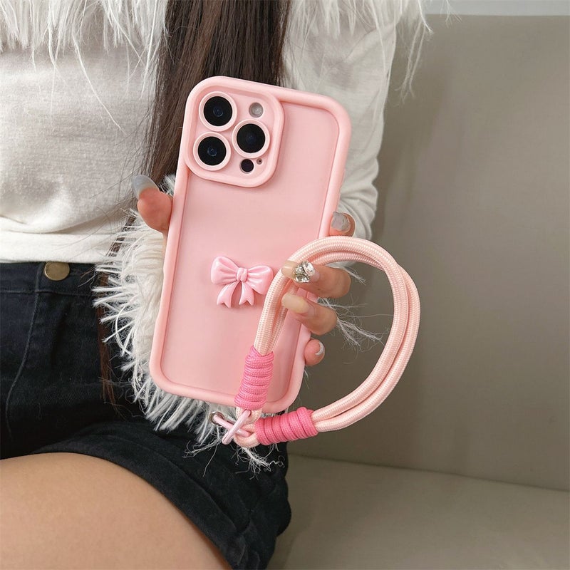 Hot Pink Phone Case with Hand Strap Bowknot Design for iPhone 16 Plus - Image 1