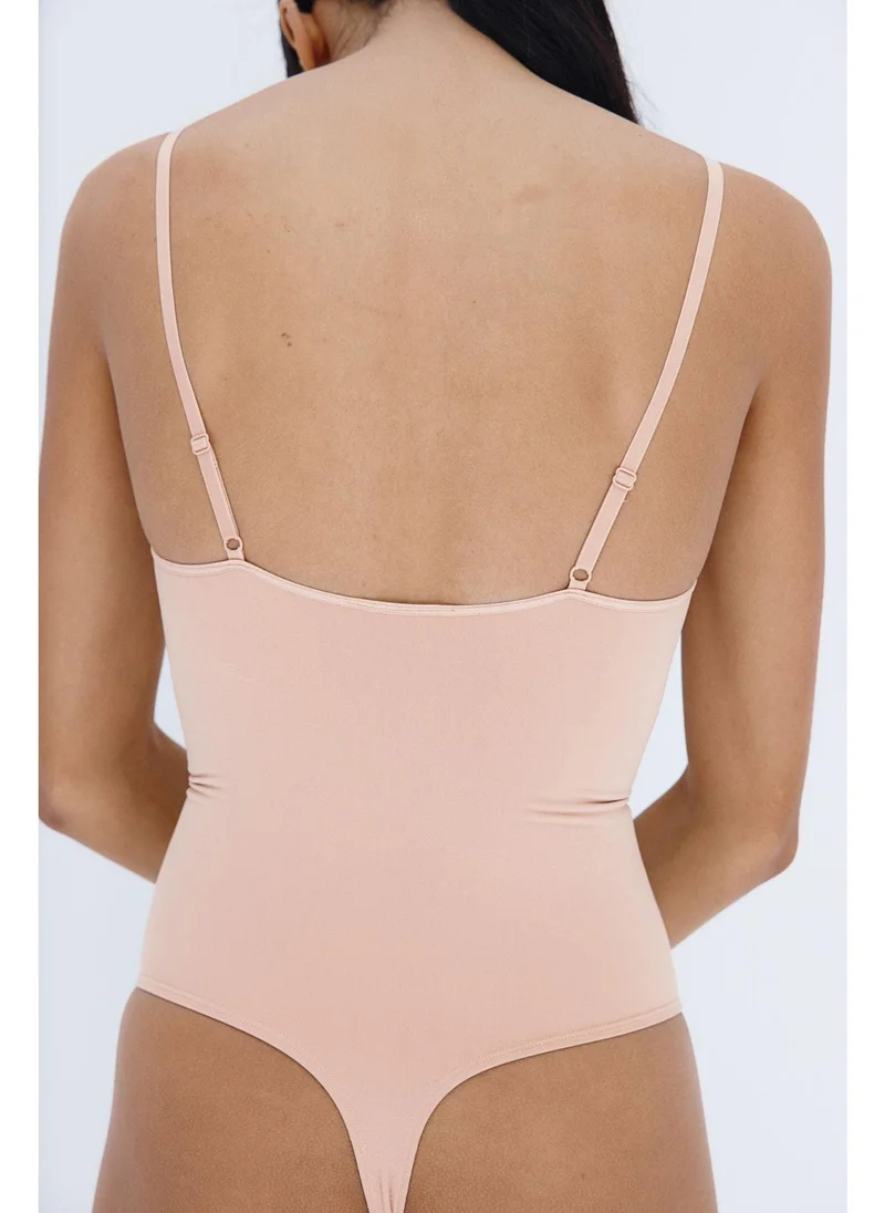 H&M Stretchy & sculpting firm shape thong body
