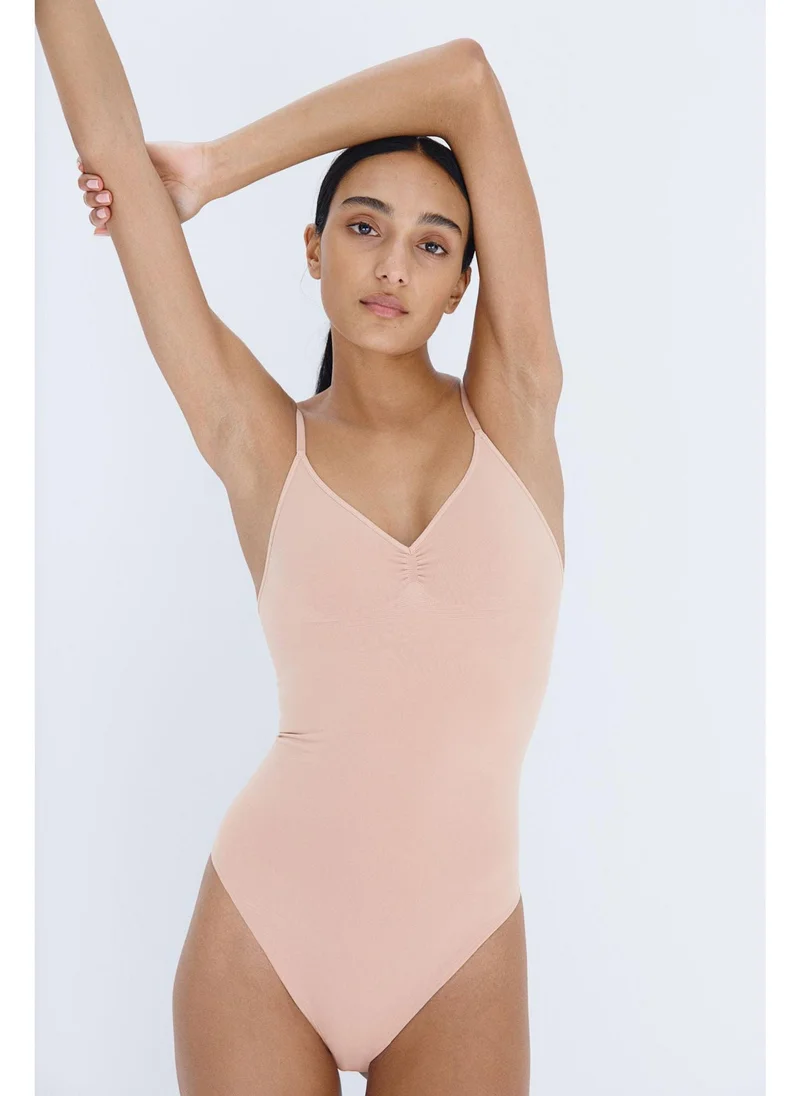 H&M Stretchy & sculpting firm shape thong body