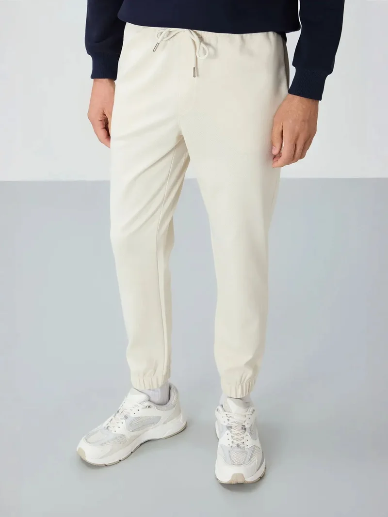 تومي لايف TOMMY Men's Regular Fit Fleece Sweatpants