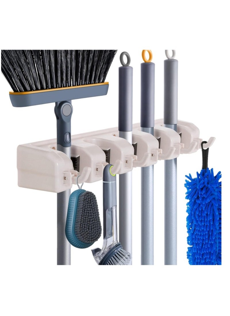 Generic The Perfect Solution for Organizing Cleaning Tools and Kitchen - Mop Holder, Broom Organizer with 5 Slots - , Wall-Mounted Heavy-Duty Holder for Brooms and Mops with 5 Slots and 6 Hooks for Home, Garden, Garage, and Storage Room. Wall-Mounted Organizer for Brooms, Mops, Dusters, and Brushes, Plastic, Kitchen Organizer, Multi-Position Broom Rack, Wall-Mounted Mop Organizer, Broom Holder for Wall with 5 Slots and 6 Hooks for Home, Kitchen, and Garden Use.  - Image 1