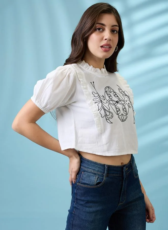 جلو باص بلوزة مطرزة بكشكش وأكمام منفوخة