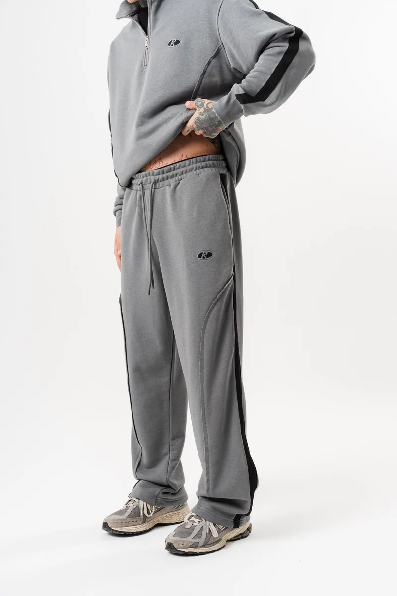 ريسباير بنطلون رياضي رجالي واسع (Baggy) من قماش قطري (Diagonel) بتفاصيل غرزة خشنة (Pis Dikiş) لون رمادي