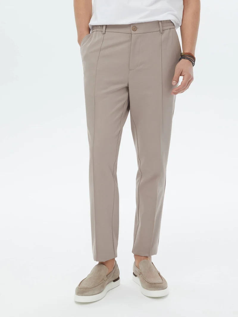 كيب Mink Woven Jogging Fit Casual Trousers