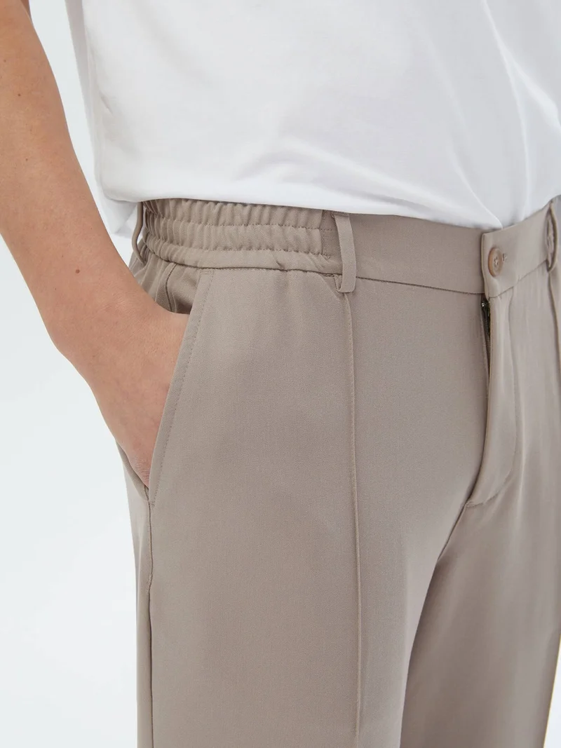 كيب Mink Woven Jogging Fit Casual Trousers