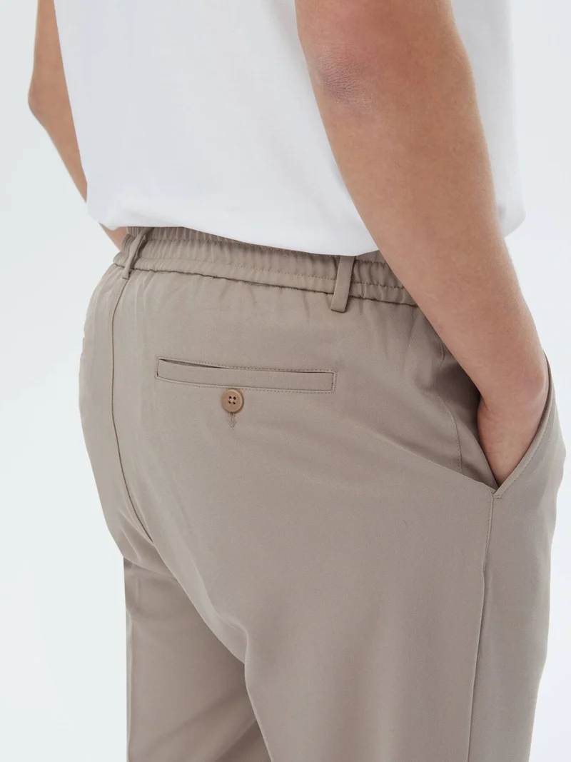 كيب Mink Woven Jogging Fit Casual Trousers