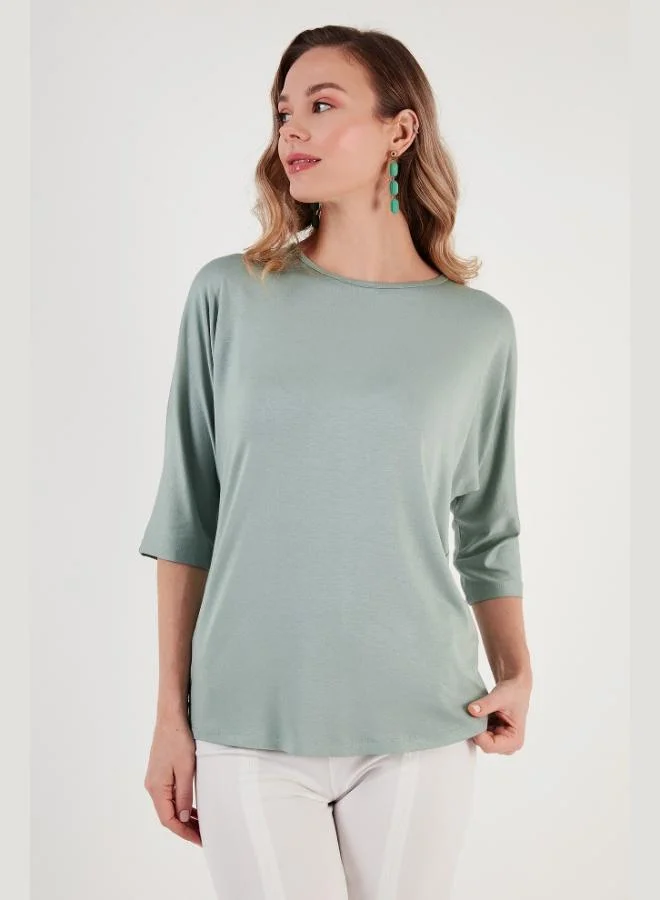 ليلا بلوزة نسائية ليلى بقصة قياسية بياقة دائرية وأكمام ثلاثة أرباع عبوة من قطعتين