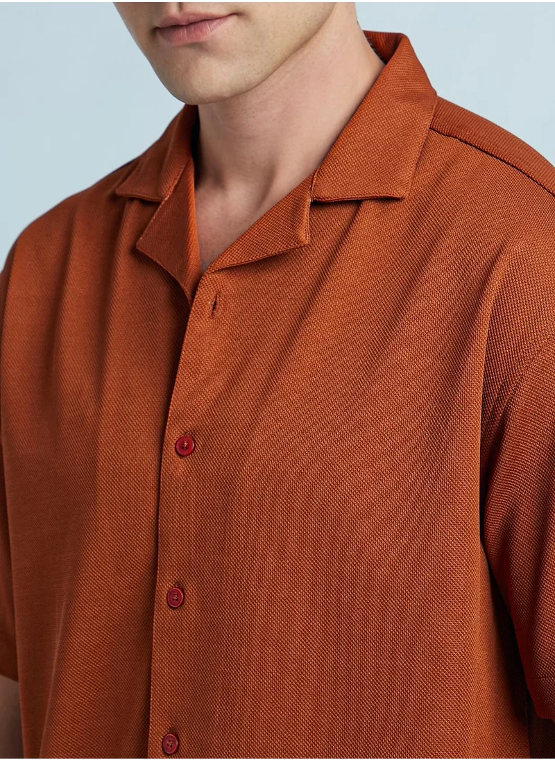Dennis Lingo Rust Relaxed fit Shirts Textured design crafted from 100% Polyester featuring Half Sleeve with Button closure.