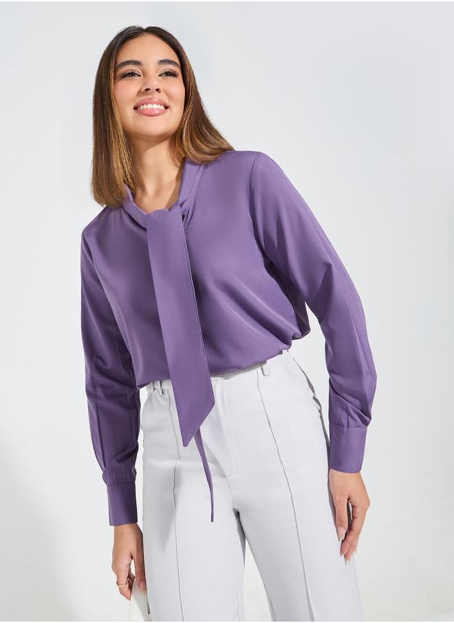 Solid Regular Fit Tie-Up Neck Top with Long Cuffed Sleeve - pzsku/ZA16CF264FFFE8EB962B2Z/45/_/1723453515/4f3ad529-00fa-4ad9-9625-edcf4fc91d4e