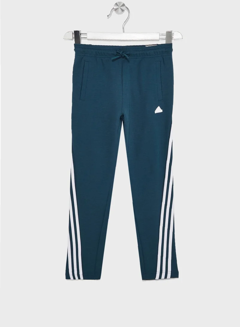 adidas بنطال جوجرز فيوتشر ايقونز يصل للكاحل مزين بـ 3 خطوط