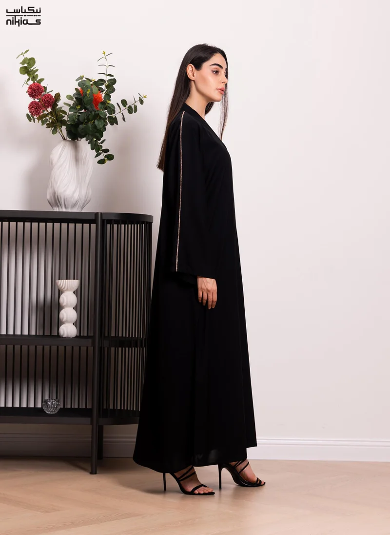 نيكياس Nikias Nida fabric abaya with a copper cord