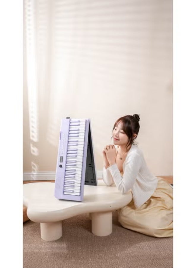 والالا بيانو ذكي MIDI قابل للطي بالحجم الكامل للمبتدئين والبالغين، بيانو إلكتروني محمول متعدد الوظائف قابل لإعادة الشحن مع دواسة استدامة للبيانو الإلكتروني 88 مفتاحًا وحقيبة بيانو، سماعات أذن كبيرة، دواسة استدامة، مشبك موسيقى، قماش بيانو، غطاء بيانو 88، ورقة موسيقية 88، كابل OTG، كابل صوت، أرجواني 3.8 كجم - Image 4