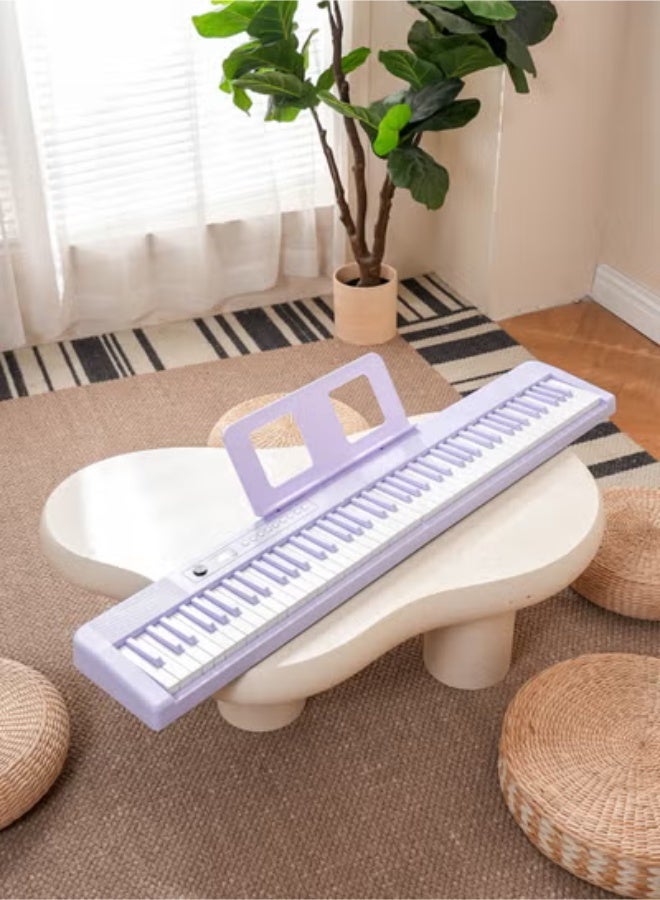 والالا بيانو ذكي MIDI قابل للطي بالحجم الكامل للمبتدئين والبالغين، بيانو إلكتروني محمول متعدد الوظائف قابل لإعادة الشحن مع دواسة استدامة للبيانو الإلكتروني 88 مفتاحًا وحقيبة بيانو، سماعات أذن كبيرة، دواسة استدامة، مشبك موسيقى، قماش بيانو، غطاء بيانو 88، ورقة موسيقية 88، كابل OTG، كابل صوت، أرجواني 3.8 كجم - Image 3