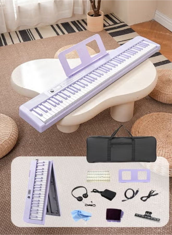 والالا بيانو ذكي MIDI قابل للطي بالحجم الكامل للمبتدئين والبالغين، بيانو إلكتروني محمول متعدد الوظائف قابل لإعادة الشحن مع دواسة استدامة للبيانو الإلكتروني 88 مفتاحًا وحقيبة بيانو، سماعات أذن كبيرة، دواسة استدامة، مشبك موسيقى، قماش بيانو، غطاء بيانو 88، ورقة موسيقية 88، كابل OTG، كابل صوت، أرجواني 3.8 كجم - Image 1