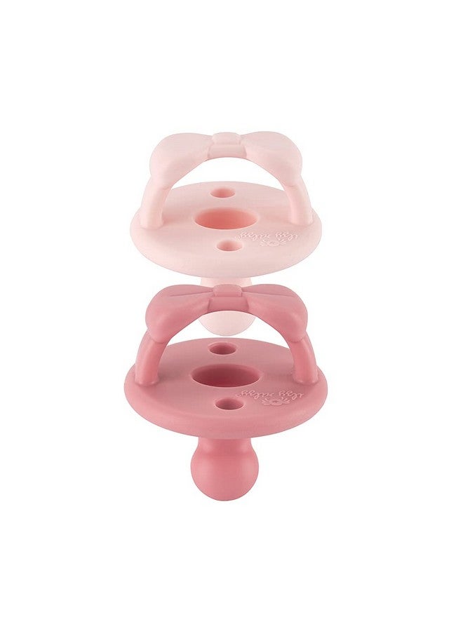 Itzy Ritzy لهايات إيتزي ريتزي السيليكونية التقويمية - لهاية إيتزي مع مقبض قابل للطي وفتحتين للهواء لزيادة الأمان، لهايات للأطفال من عمر 0 - 6 أشهر (حذاء الباليه وزهرة الربيع) - Image 4